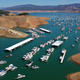 In an aerial view, houseboats sit anchored at the Bidwell Canyon Marina on Lake Oroville on Memorial Day.